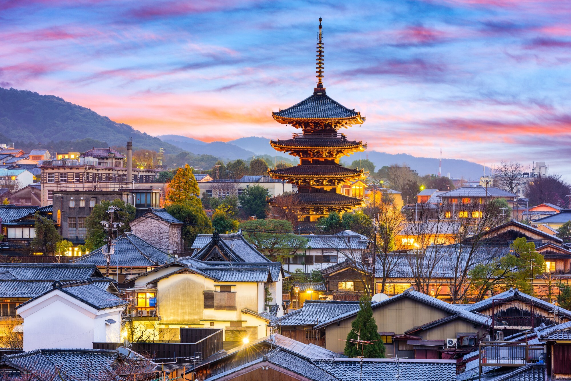 Scenic Kyoto landscape with traditional buildings and mountains